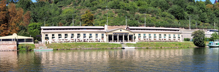Obraz premium view of Prague from the deck of a steamer, historical city center, panorama on the Vltava, sunny summer day, tourism