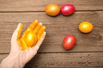 Painted Easter Egg in a Female Hand