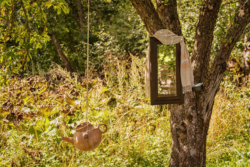 Washstand and mirror on a tree