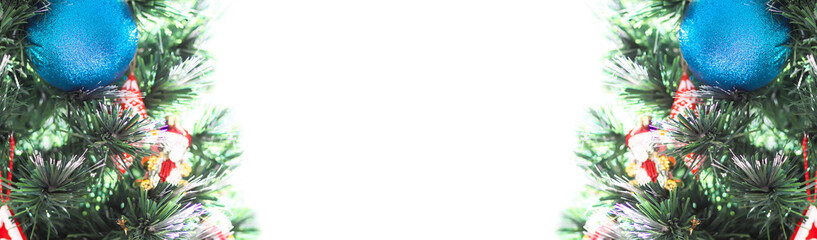 Decorated Christmas tree branches. Symmetrical New Year poster or banner.