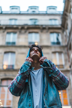 Young man looking up