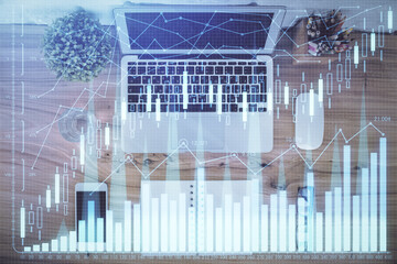 Multi exposure of financial chart drawing over table background with computer. Concept of research. Top view.