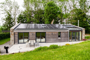 Detached house with solar panels on the roof