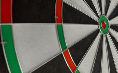 Dart board with white, green and red fields. New plastic target.