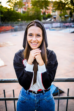 Portrait of young woman at skatepark