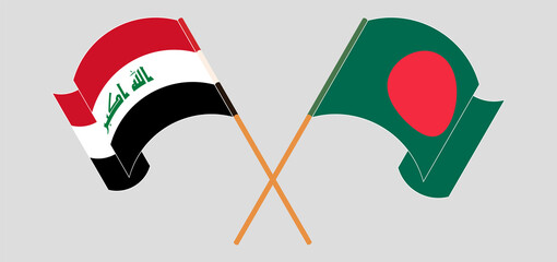 Crossed and waving flags of Iraq and Bangladesh