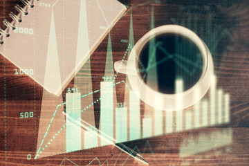 Multi exposure of forex chart drawing and work table top veiw. Concept of financial analysis.