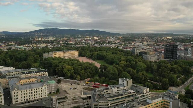 Oslo, Norway. Beautiful 4K panoramic aerial video from flying drone to Oslo of the Royal Palace and Statue of King Karl Johan. In the background the castle park, the city and the mountains (Series)