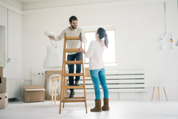 Couple moving into new home