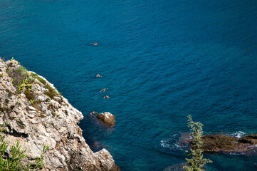 Taormina Mare is the coastal resort of Taormina high on its hilltop. It is a popular tourist resort with a sweeping bay. There is a frequent cable car service that takes people up and down to the sea