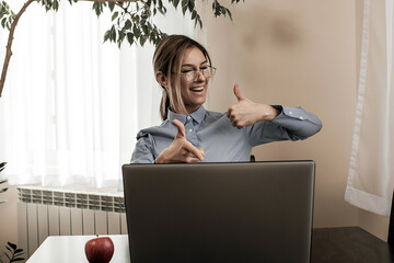 Excited female student feels euphoric celebrating online win success achievement result, young...