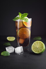 Mojito cocktail on black.
