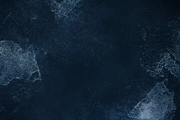 Deep blue stone background, textured, top view, close up.