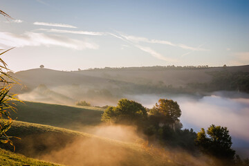 Tuscan landscape on a foggy morning, Italy