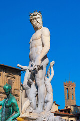 Fototapeta na wymiar Statue of Triton in Piazza della Signoria in Florence, Italy