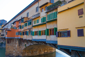 Fototapeta na wymiar The ancient Ponte Vecchio across the river Arno in Florence, Italy