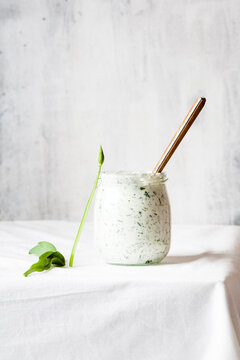 Jar of homemade quark with ramson