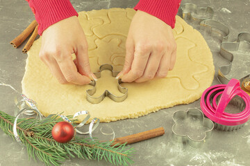 Molds and gingerbread dough for Christmas cookies
