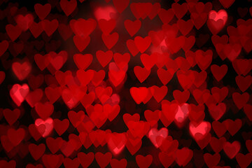 Beautiful red heart shaped lights on dark background, blurred view. Valentine's day