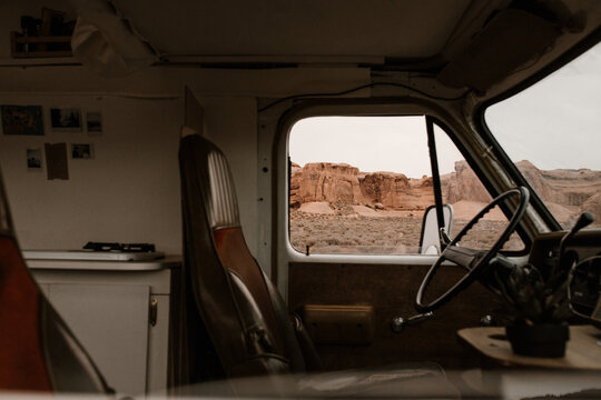 desert landscape through drivers window of van