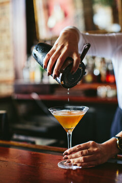Orange Martini being made
