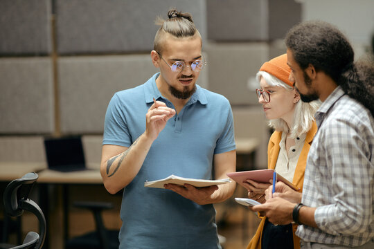 Young People Discussing Project Issues