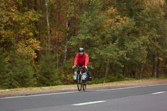 Caucasian Man Travelling By Bike