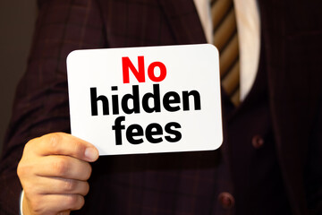 A businessman holding a business card with the words, No Hidden Fees, written on it.