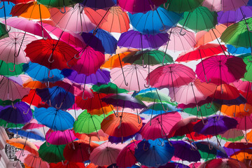 Fototapeta na wymiar Detail of colorful umbrellas in the streets of the center of Caracas in Venezuela
