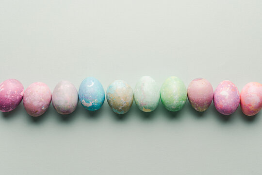 Colorful dyed eggs in a row
