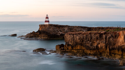 A long exposure of the iconic Obelisk built on now heavily eroding cliff faces located in the Robe South Australia on November 8th 2020