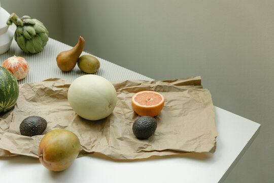 fruit laid out on a table on paper bag