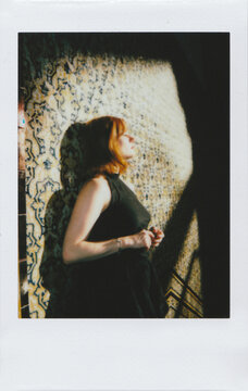 Beautiful Redhead Woman Calmly Enjoying the Sun