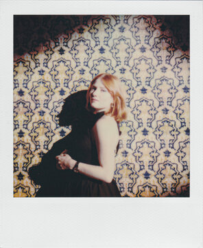 Attractive Redhead Woman on Pattern Background