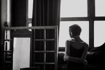 Asian girl in a dark room.