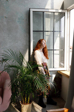 Red hair girl in a room