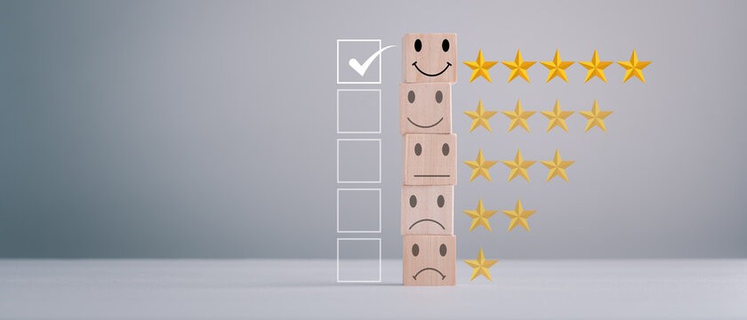 feedback rating and positive customer review experience, service and Satisfaction, wood block with 1 to 5 star icon to give satisfaction in service. rating very impressed. Mental Health Assessment.