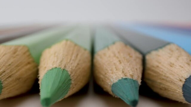 Coloured pencils in a row