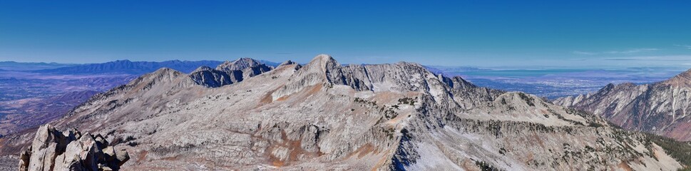 View of Pfeifferhorn peak and Lone Peak Wilderness mountain landscape from White Baldy and Pfeifferhorn trail, towards Salt Lake Valley, Wasatch Rocky mountain range, Utah, United States. 