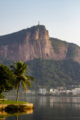 Fototapeta na wymiar Rodrigo de Freitas lagoon with Christ the Redeemer in the background in Rio de Janeiro, Brazil.