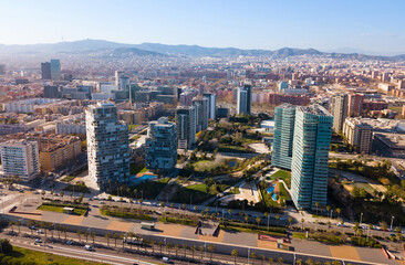 Fototapeta na wymiar Aerial view of new residential complex of Diagonal Mar i el Front Maritim del Poblenou in sunny day, Barcelona, Spain..