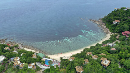 Aerial drone view over Sai Deng Beach on the paradise diving island of Koh Tao in the Gulf of Thailand