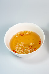 Homemade Vietnamese sweet fish sauce with chili pepper and garlic