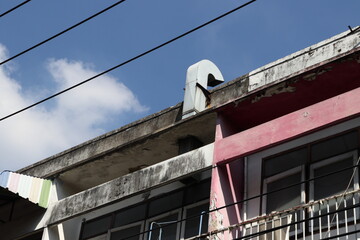 Obraz premium Old Ventilation metal pipe installed top of the building. 
