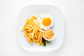 cutlet with egg and french fries