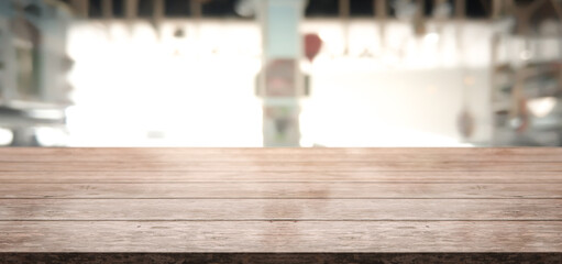 Empty wood table with blur vintage restaurant background.	