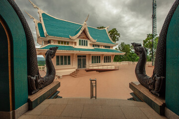 Fototapeta premium Reclining Buddha Temple Wat Pa Phu Kon-Udon Thani:June18,2020,the atmosphere inside the Reclining Buddha Temple,the Lecturer, Mahamuni Buddha, located on a high mountain in the Yung area,thailand