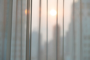 White curtains and morning sunlight