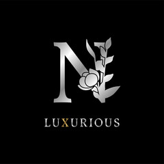 letter N flower leaves decoration for wedding, beauty care logo, personal branding identity, make up artist or any other royal brand and company. luxurious gold and silver color sample in dummy text