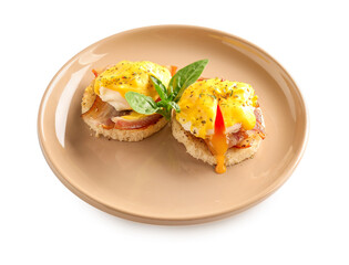 Plate with tasty eggs Benedict on white background